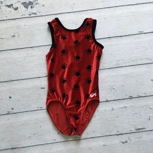 GK girls size large leotard red and black paw print pattern used